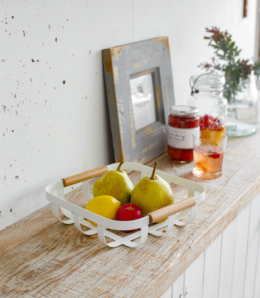 View 2 - White Fruit Bowl displaying fruit on shelf by Yamazaki Home.