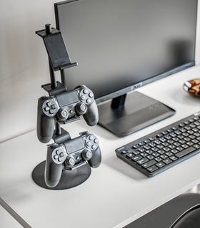 Black Controller Stand displaying Xobx controllers on desk by Yamazaki Home. view 10