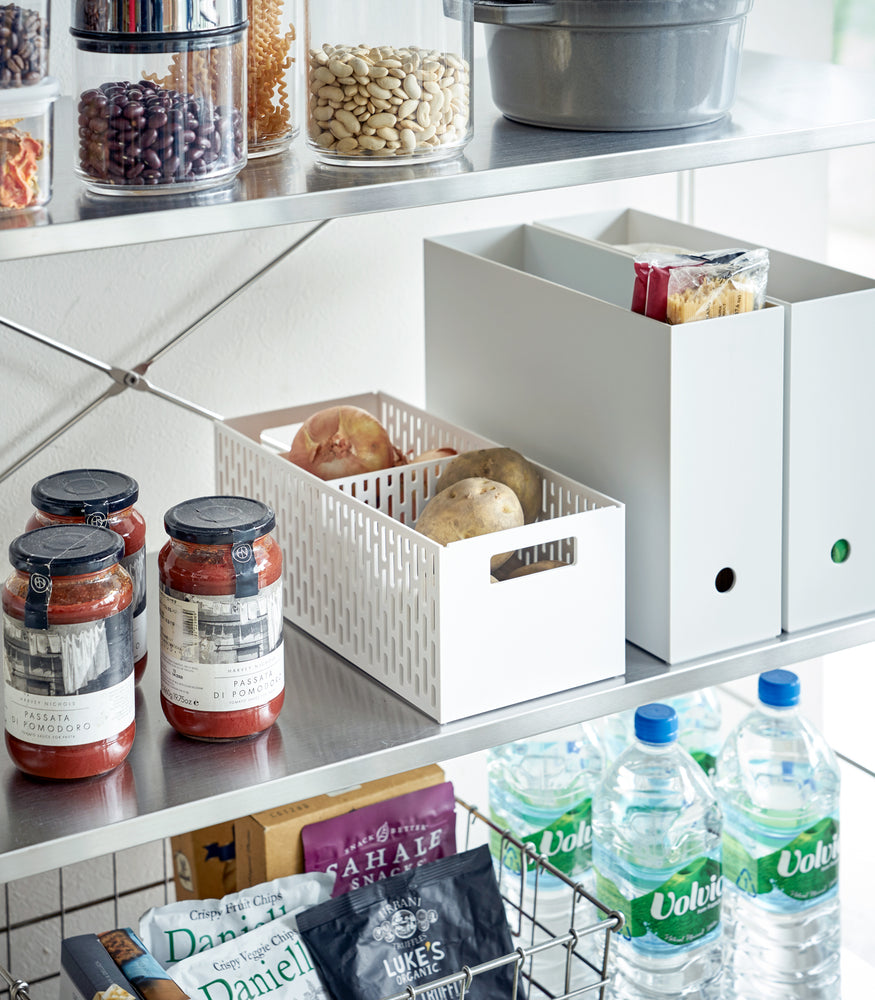 View 2 - White Stackable Vegetable Stockers holding onion and potatoes on kitchen pantry shelf by Yamazaki Home.