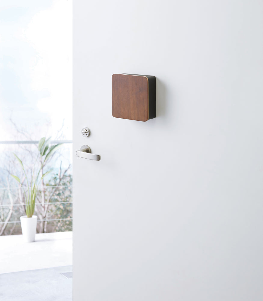 View 10 - Closed black with wood Square Magnetic Key Cabinet on door by Yamazaki Home.