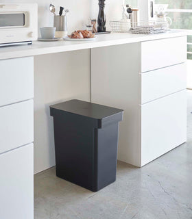 Black Rolling Trash Can in the kitchen by Yamazaki Home. view 9