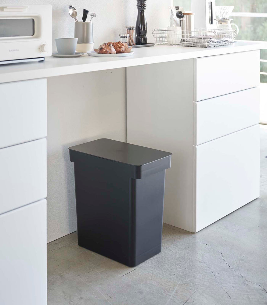 View 9 - Black Rolling Trash Can in the kitchen by Yamazaki Home.